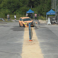 Test vehicle during impact test TB32 to a rammed safety barrier