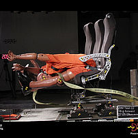 Aircraft seat during a 16 g structural test with floor deformation
